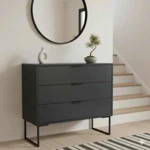 Modern slate grey chest of drawers for hallway with minimalist metal handles.