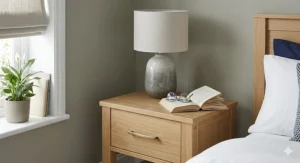 A pair of affordable grey bedside tables with brushed chrome handles, perfectly matched for a contemporary look.