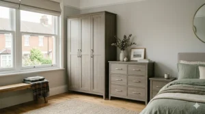 Close-up of the natural oak veneer finish on a matching wardrobe and chest of drawers set.