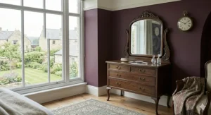 A dark walnut dresser with attached mirror in a classic Queen Anne style, perfect for period British homes.