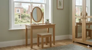 A sleek dressing table and padded stool, ideal for a UK master bedroom suite.