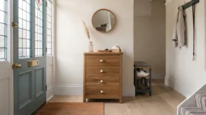 A durable solid oak hallway storage unit featuring deep drawers for shoes, keys, and everyday clutter.
