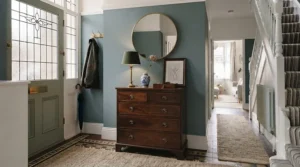 A classic, period-style narrow chest of drawers adding character to a Victorian hallway.