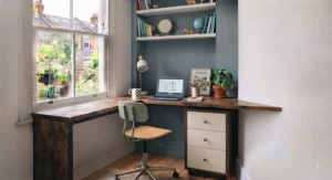 Compact children's bedroom study nook featuring a small desk and matching drawer unit for schoolwork.