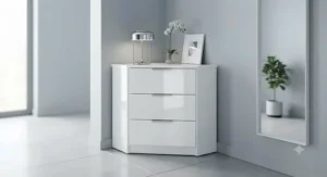 Detailed shot of contemporary matte black metal drawer pulls on a grey painted corner chest.