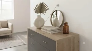 A neutral-toned space-saving chest of drawers styled with minimalist home accessories.