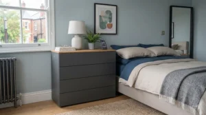 Fully styled contemporary bedroom featuring the smart storage chest accessorised with a bedside lamp and ceramic vase.
