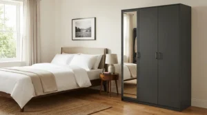 A newly assembled flat-pack freestanding wardrobe with mirror standing proudly in a freshly decorated guest bedroom.